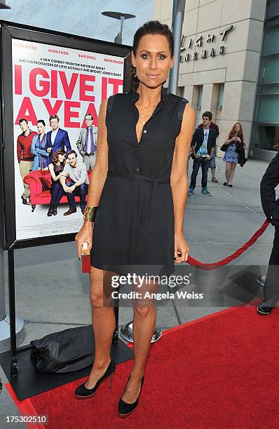 Actress/singer Minnie Driver arrives at the Screening of Magnolia Pictures' 'I Give It A Year' at ArcLight Hollywood on August 1, 2013 in Hollywood,...