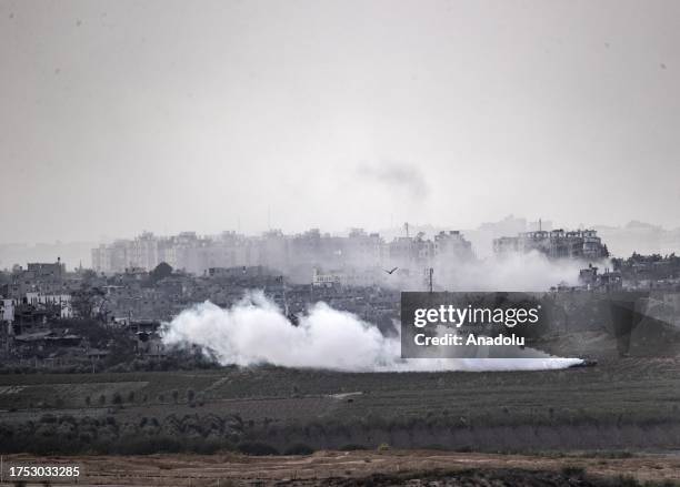 Tanks of Israeli forces are deployed on agricultural lands near the town of Beit Hanoun in the north of Gaza Strip in Sderot, Israel on October 29,...