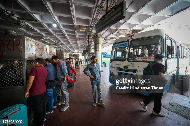 People seen inside a Bus Terminal as Gopal Rai, Environment Minister of Delhi inspects the Diesel buses that comes inside Inter State Bus Terminal at...