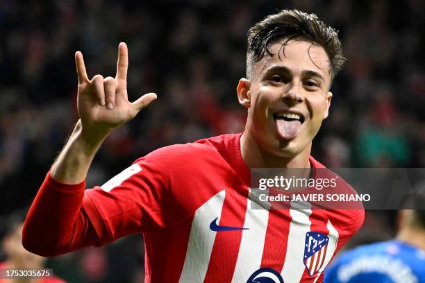 Atletico Madrid's Spanish midfielder Rodrigo Riquelme celebrates scoring the opening goal during the Spanish league football match between Club...