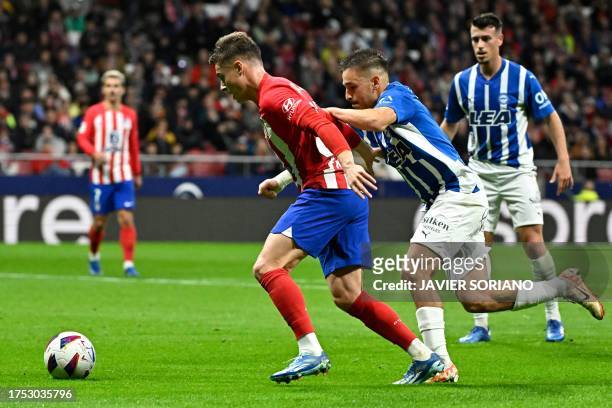 Atletico Madrid's Spanish midfielder Rodrigo Riquelme prepares to shoot and score the opening goal during the Spanish league football match between...