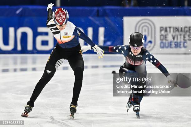 Shim Suk Hee of the Republic of Korea crosses the finish line ahead of Corinne Stoddard of the United States of America in the women's 3000 m relay...