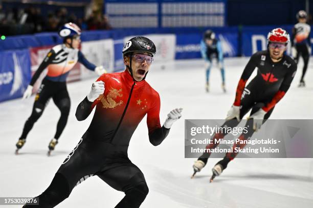 Liu Shaolin of China celebrates after helping his team finish first in the men's 5000 m relay final during the ISU World Cup Short Track at Maurice...