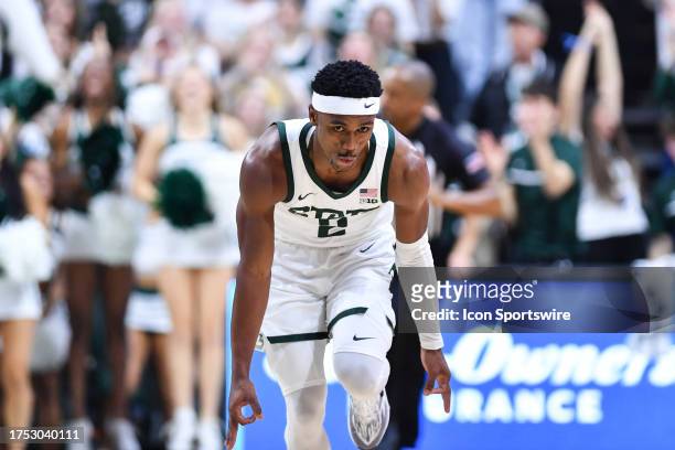 Michigan State Spartans guard Tyson Walker celebrates a second half three-pointer during a college basketball exhibition game between the Michigan...