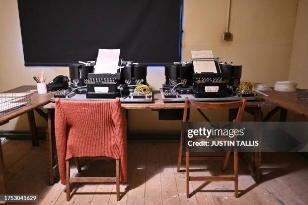 Typex machines used to decipher messages are pictured in the Decoding Room at Bletchley Park, near Milton Keynes, north of London on October 26,...