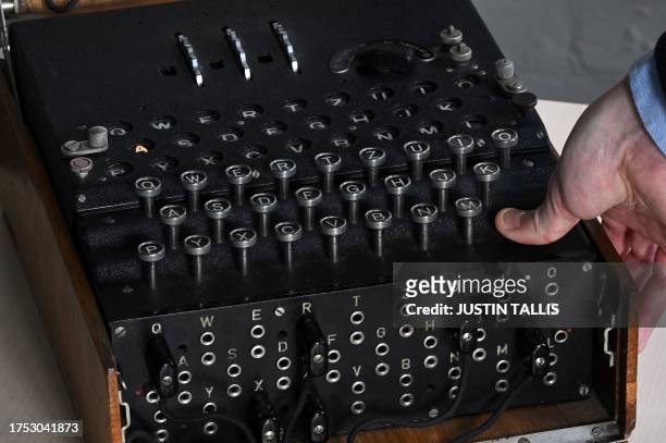 An Enigma cipher machine model I is seen at Bletchley Park, near Milton Keynes, north of London on October 26, 2023. The UK government will welcome...