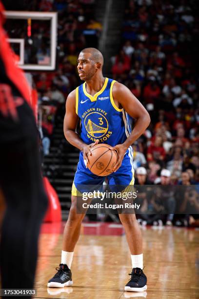 Chris Paul of the Golden State Warriors looks to pass the ball during the game against the Houston Rockets on October 29, 2023 at the Toyota Center...