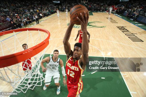 De'Andre Hunter of the Atlanta Hawks dunks the ball during the game against the Milwaukee Bucks on October 29, 2023 at the Fiserv Forum Center in...