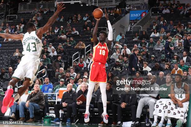 Mouhamed Gueye of the Atlanta Hawks shoots a three point basket during the game against the Milwaukee Bucks on October 29, 2023 at the Fiserv Forum...
