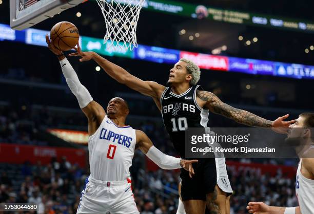 Russell Westbrook of the Los Angeles Clippers has his layup blocked by Jeremy Sochan of the San Antonio Spurs during the first half at Crypto.com...
