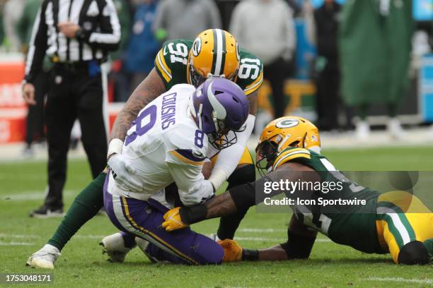 Green Bay Packers linebacker Preston Smith sacks Minnesota Vikings quarterback Kirk Cousins during a game between the Green Bay Packers and the...