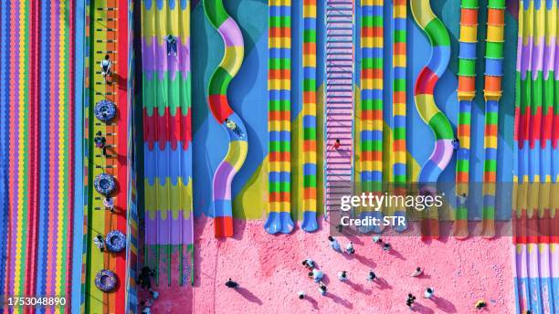 This aerial photo taken on October 29, 2023 shows people playing at a playground in China's southwestern Chongqing municipality. / China OUT