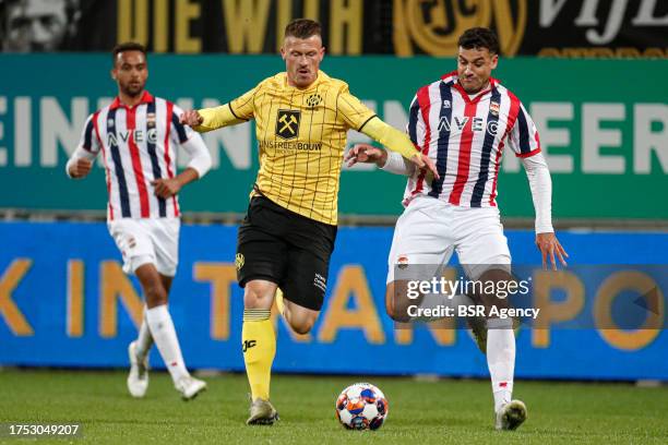 October 21 : Marvin Pourie battles for the ball with Raffael Behounek of Willem ll during the Dutch Keuken Kampioen Divisie match between Roda JC...