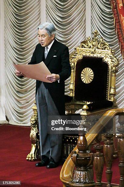 Japan's Emperor Akihito, makes a speech to members of the Parliament during the opening session at the upper house of parliament in Tokyo, Japan, on...