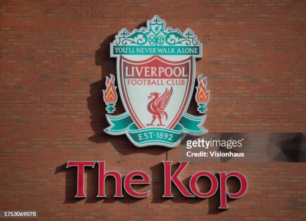 General view of the Liverpool Football Club badge on the outside of The Kop stand at Anfield ahead of the Premier League match between Liverpool FC...