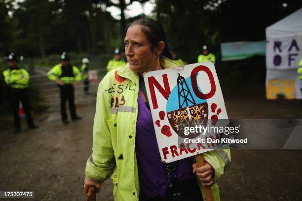 Protesters continue to gather outside the entrance gate of a drill site operated by Cuadrilla Resources Ltd on August 2, 2013 in Crawley, West...