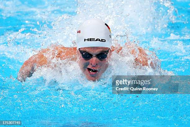 Steffen Deibler of Germany competes during the Swimming Men's 100m Butterfly preliminaries heat six on day fourteen of the 15th FINA World...