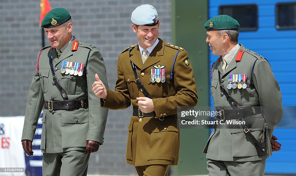 Prince Harry Visits The Royal Marines Tamar