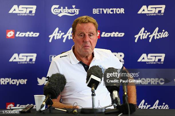 Manager Harry Redknapp of Queens Park Rangers talks to the media during a Queens Park Rangers training session on August 02, 2013 in Harlington,...