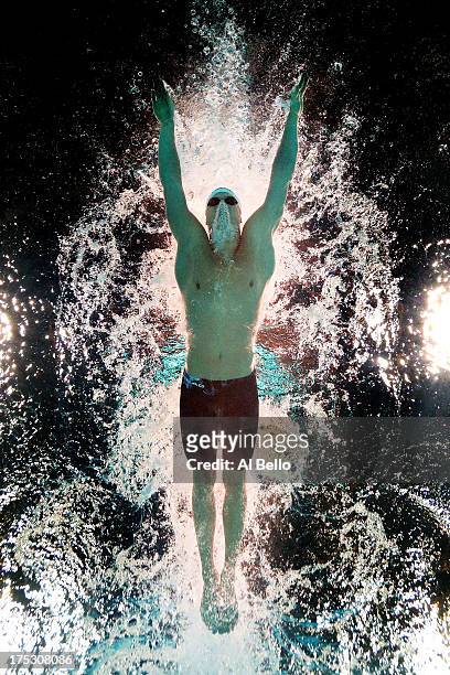 Steffen Deibler of Germany competes during the Swimming Men's 100m Butterfly heat 6 on day fourteen of the 15th FINA World Championships at Palau...