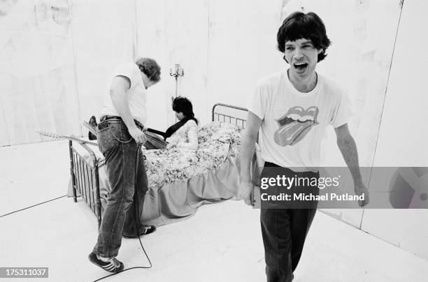 - Keith Richards lies on a prop bed as Mick Jagger laughs during the production of the music video for Rolling Stones' 'Respectable' in New York,...