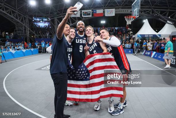 Canyon Barry, Dylan Travis, Jimmer Fredette and Kareem Maddox of Team USA after winning the Gold Medal Game of Men's Basketball 3x3 at Estadio...