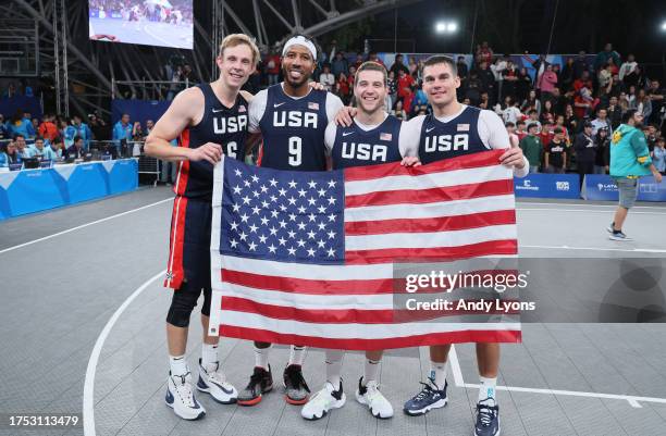 Canyon Barry, Dylan Travis, Jimmer Fredette and Kareem Maddox of Team USA after winning the Gold Medal Game of Men's Basketball 3x3 at Estadio...