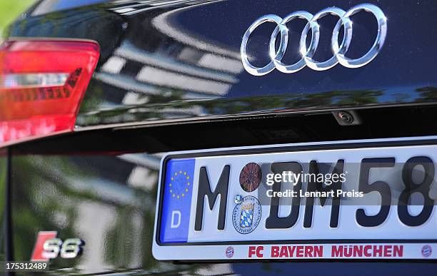 The license plate of the team of FC Bayern Muenchen is pictured on a car during the handover of the new cars at Audi Forum on August 2, 2013 in...