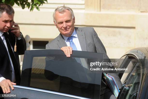 France's Prime Minister Jean-Marc Ayrault leaves Elysee Palace after attending the weekly cabinet meeting August 2, 2013 in Paris, France. Today was...