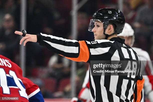 Referee Beaudry Halkidis prepares to start the third period between the Montreal Canadiens and the Washington Capitals at the Bell Centre on October...