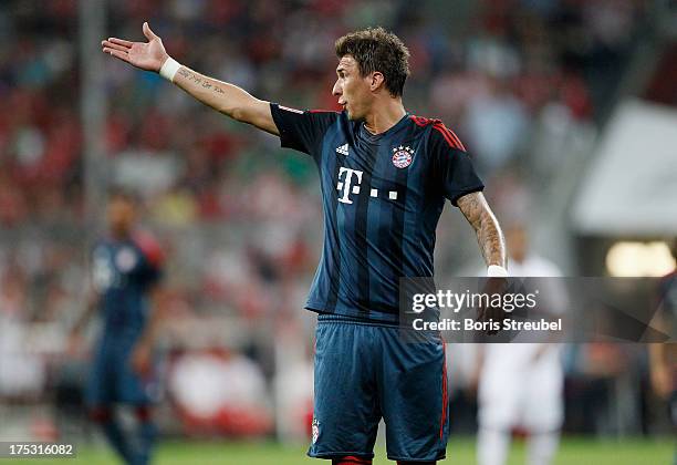 Mario Mandzukic of Muenchen gestures during the Audi Cup 2013 semifinal match between FC Bayern Muenchen and FC Sao Paulo at Allianz Arena on July...