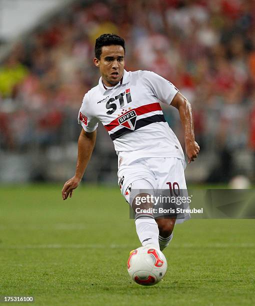 Jadson of Sao Paulo runs with the ball during the Audi Cup 2013 semifinal match between FC Bayern Muenchen and FC Sao Paulo at Allianz Arena on July...