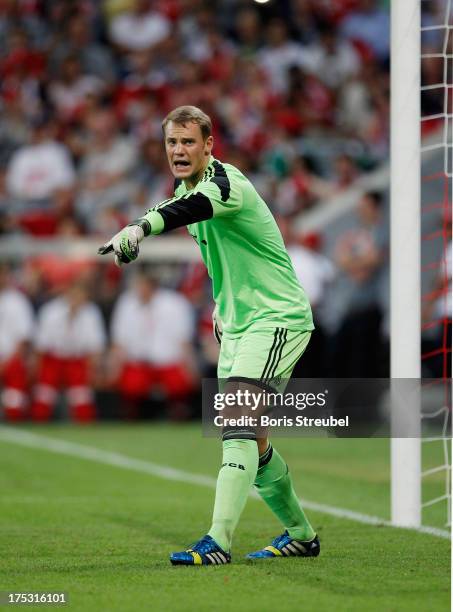 Goalkeeper Manuel Neuer of Muenchen gestures during the Audi Cup 2013 semifinal match between FC Bayern Muenchen and FC Sao Paulo at Allianz Arena on...