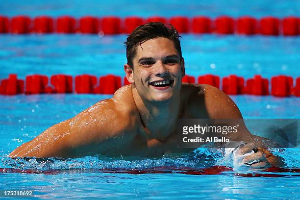 Florent Manaudou of France celebrates after the Swimming Men's Freestyle 50m Semifinal heat 2 on day fourteen of the 15th FINA World Championships at...