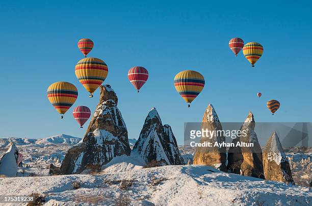 hot air ballooning in cappadocia - cappadocia hot air balloon stock pictures, royalty-free photos & images