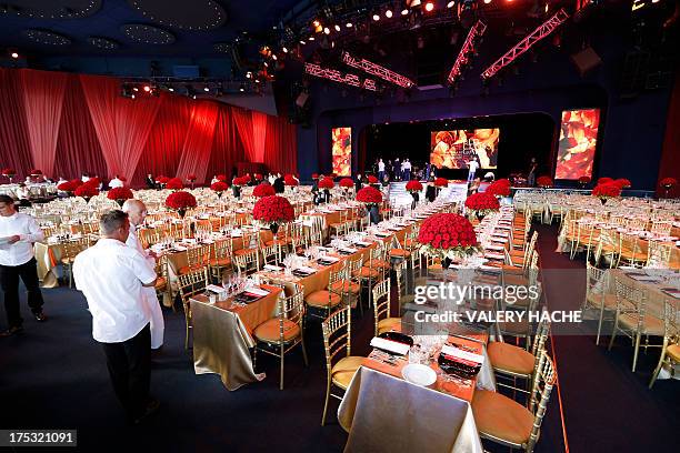 Tables are displayed in the dining room prior to the 65th annual Red Cross Gala at the Monte-Carlo Sporting Club in Monaco, on August 2, 2013....