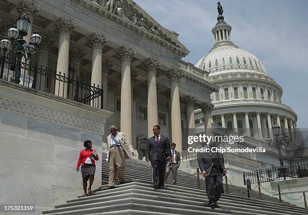 Rep. Charles Rangel , U.S. Rep. Keith Ellison and U.S. Rep. Hakeem Jeffries leave the U.S. Capitol as Congress begins its summer recess August 2,...