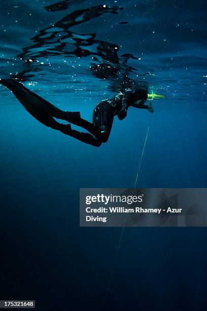 Free Diver Resting On Surface High-Res Stock Photo