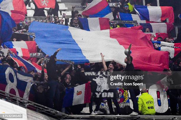 Fans Lyon with French Flag and with a banner Mezza Lyon, group right-extrem during the Ligue 1 Uber Eats match between Olympique de Marseille and...