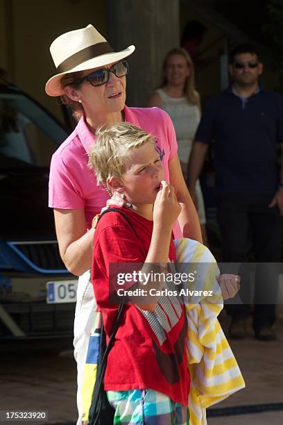 Princess Elena of Spain and Miguel Urdangarin at the Calanova Sailing School on August 02, 2013 in Palma de Mallorca, Mallorca, Spain.