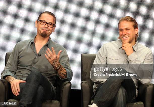 Creator/Executive Producer Kurt Sutter and actor Charlie Hunnam speak onstage during the "Sons of Anarchy" panel discussion at the FX portion of the...