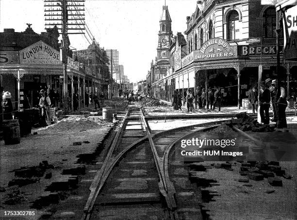 Image shows tramlines being laid in Fremantle, Western Australia, in 1905. The photographer is standing on the west side of Market Street, looking...