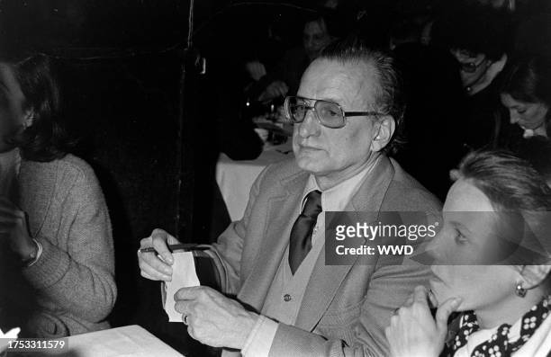 George C. Scott and Trish Van Devere attend an awards ceremony at Sardi's in New York City on January 30, 1977.