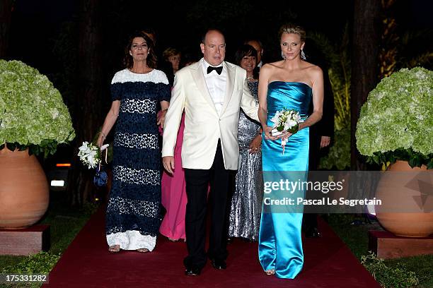 Princess Caroline of Hanover, Prince Albert II of Monaco and Princess Charlene of Monaco attend the 65th Monaco Red Cross Ball Gala at Sporting...