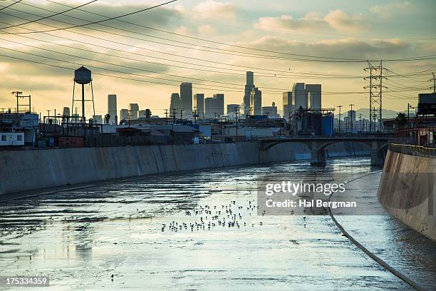 los angeles river and downtown skyline - vernon ca ストックフォトと画像