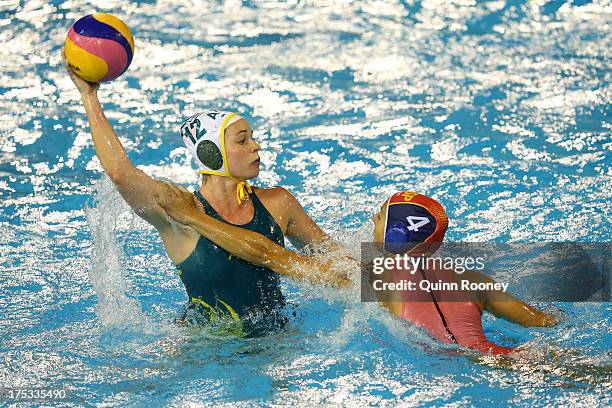 Nicola Zagame of Australia controls the ball against Roser Tarrago of Spain during the Women's Water Polo Gold Medal Match between Australia and...