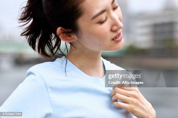 sweat and hot japanese woman - collar stock pictures, royalty-free photos & images