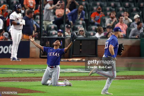 Jose Leclerc of the Texas Rangers celebrates the final out to defeat the Houston Astros in Game Seven to win the American League Championship Series...