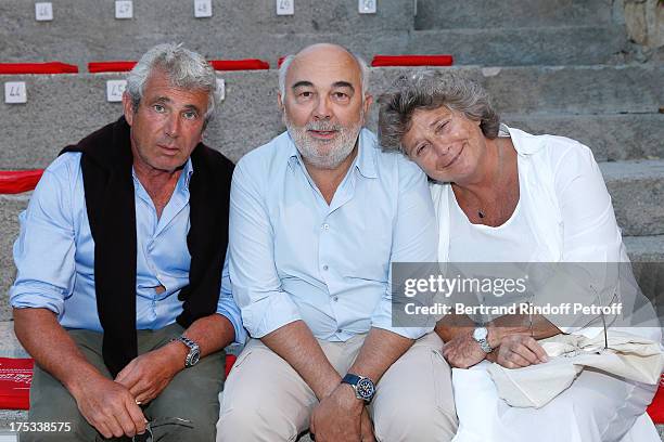 Artistic Director of the Festival Michel Boujenah, actor Gerard Jugnot and President of Ramatuelle Festival Jacqueline Franjou attend 'Student and...