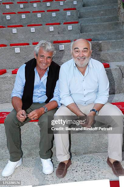 Artistic Director of the Festival Michel Boujenah and actor Gerard Jugnot attend 'Student and Mr. Henri' play at 29th Ramatuelle Festival : Day 3 on...